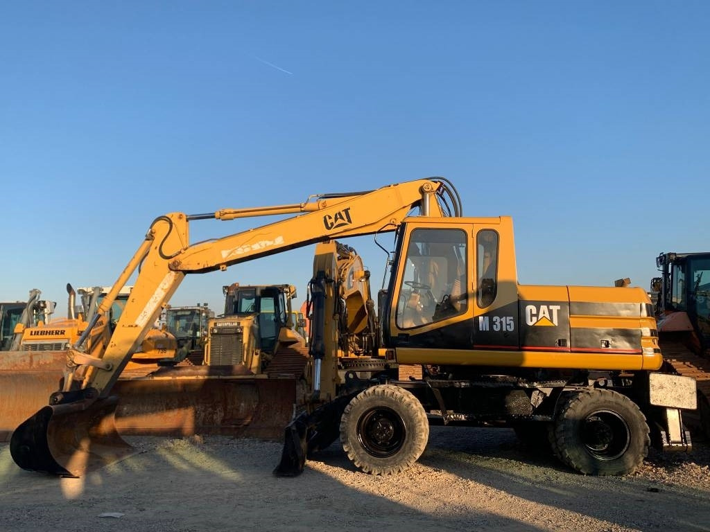 CAT M 315 - Máy xúc bánh lốp: hình 3 CAT M 315 - Máy xúc bánh lốp: hình 3