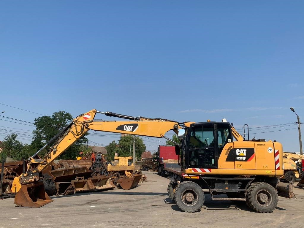 CAT M 318 F - Máy xúc bánh lốp: hình 2 CAT M 318 F - Máy xúc bánh lốp: hình 2