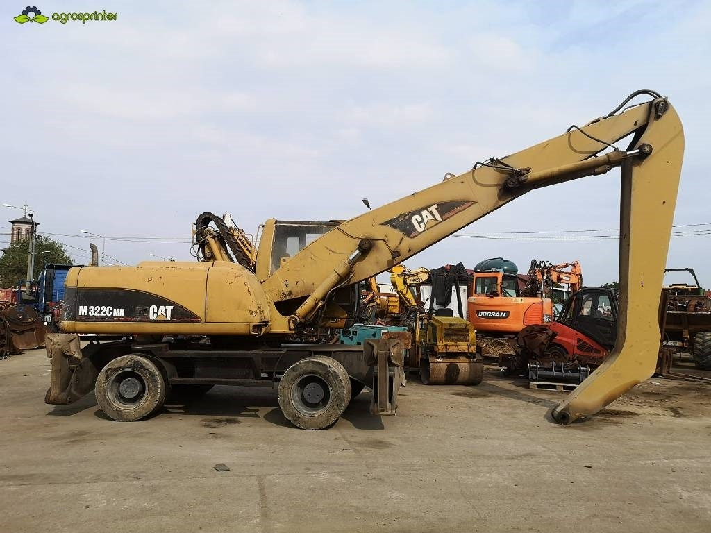 CAT M 322 C MH - Máy cạp rác/ Công nghiệp: hình 5 CAT M 322 C MH - Máy cạp rác/ Công nghiệp: hình 5