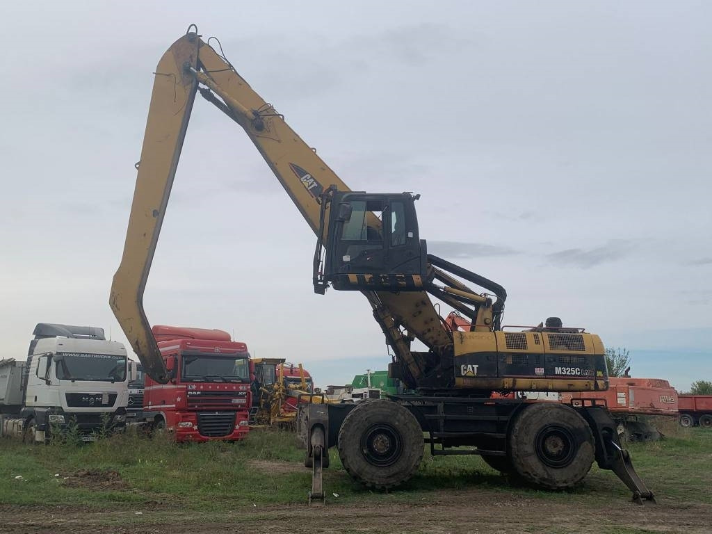 CAT M 325 C L MH - Máy cạp rác/ Công nghiệp: hình 2 CAT M 325 C L MH - Máy cạp rác/ Công nghiệp: hình 2
