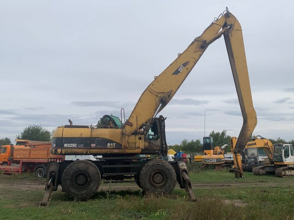CAT M 325 C L MH - Máy cạp rác/ Công nghiệp: hình 5 CAT M 325 C L MH - Máy cạp rác/ Công nghiệp: hình 5