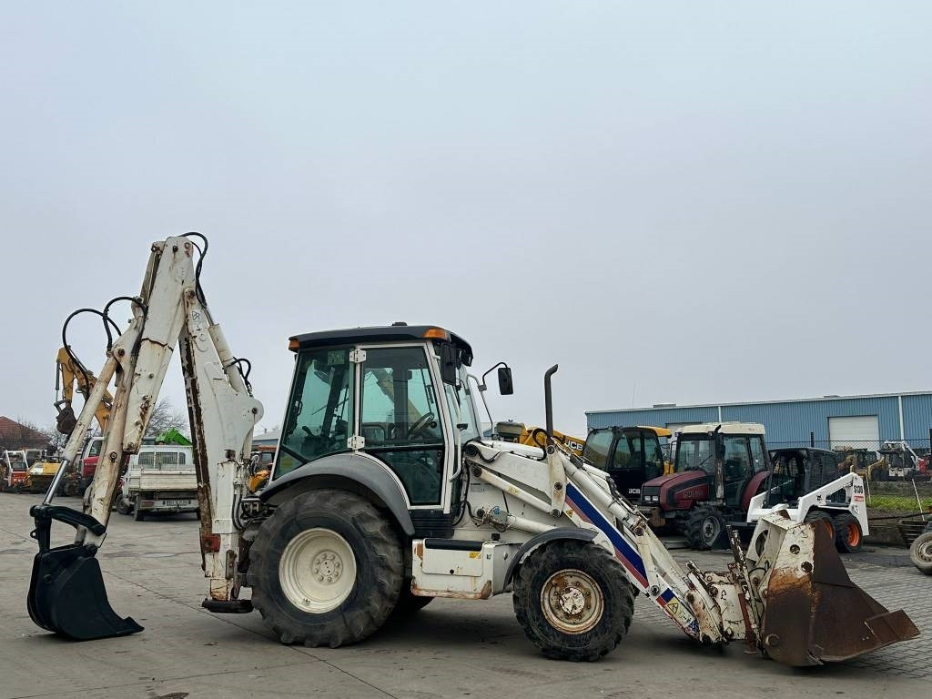 Case SR590-4PS - Máy xúc trước múc sau: hình 3 Case SR590-4PS - Máy xúc trước múc sau: hình 3