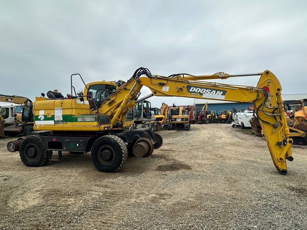 Doosan DX 160 WR - Máy xúc bánh lốp: hình 4 Doosan DX 160 WR - Máy xúc bánh lốp: hình 4