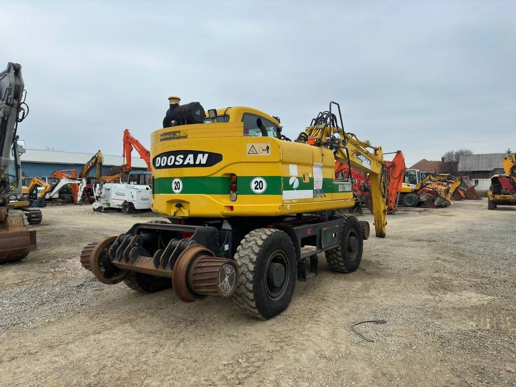 Doosan DX 160 WR - Máy xúc bánh lốp: hình 5 Doosan DX 160 WR - Máy xúc bánh lốp: hình 5