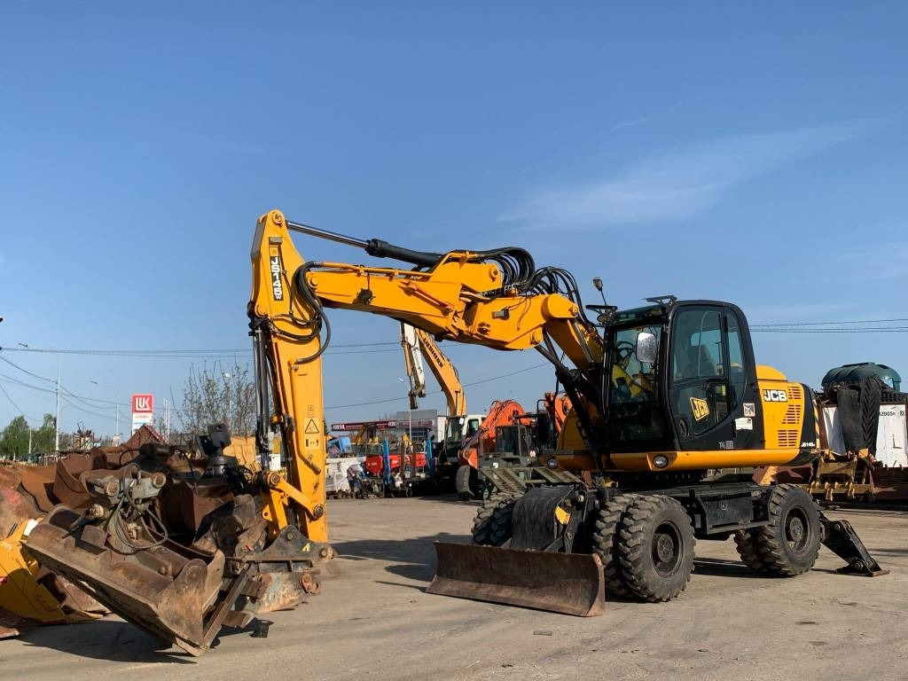 JCB JS 145 W - Máy xúc bánh lốp: hình 1 JCB JS 145 W - Máy xúc bánh lốp: hình 1