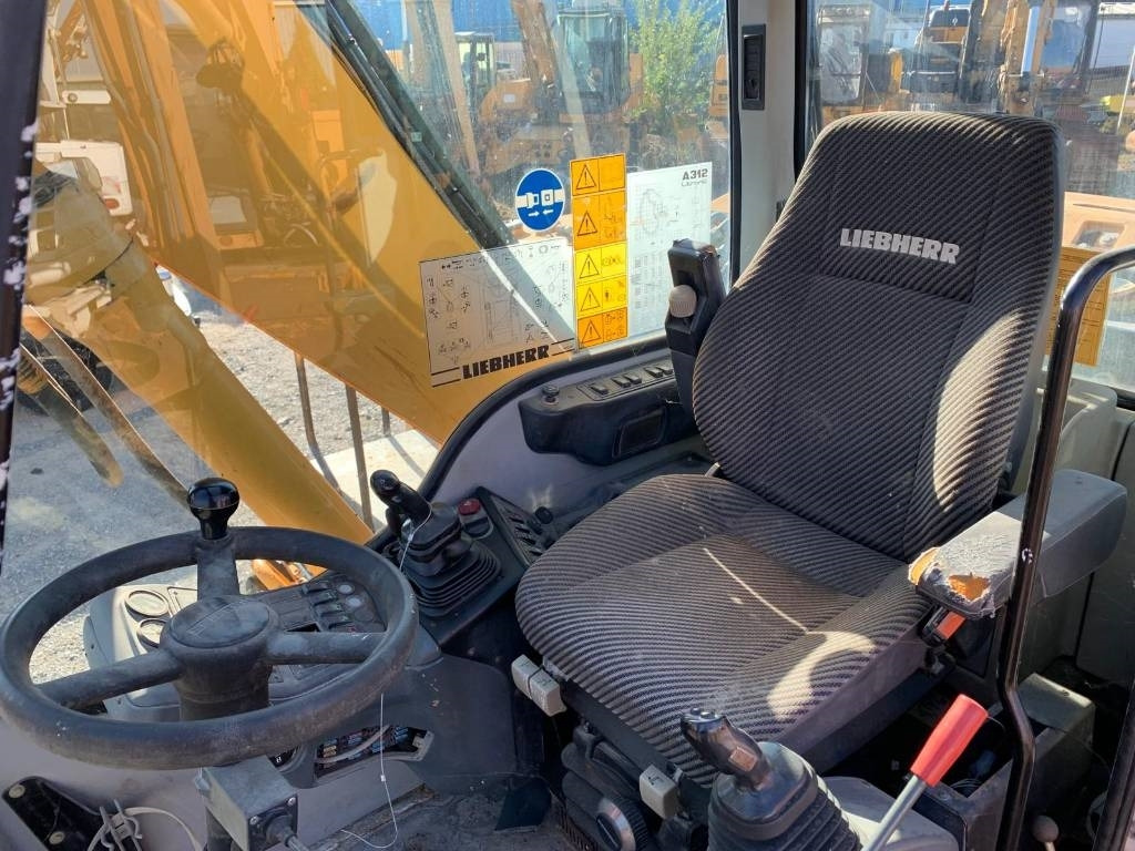 Máy xúc bánh lốp Liebherr A 312: hình 9 Máy xúc bánh lốp Liebherr A 312: hình 9