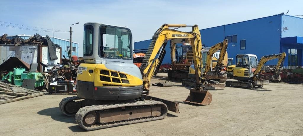 New Holland E 50.2 C - Máy xúc mini: hình 2 New Holland E 50.2 C - Máy xúc mini: hình 2