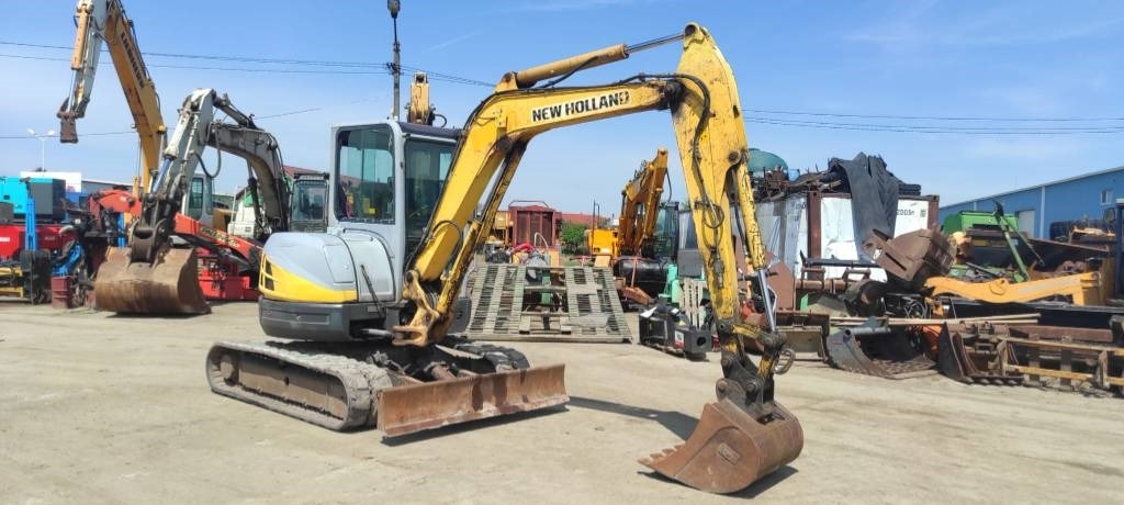 New Holland E 50.2 C - Máy xúc mini: hình 1 New Holland E 50.2 C - Máy xúc mini: hình 1