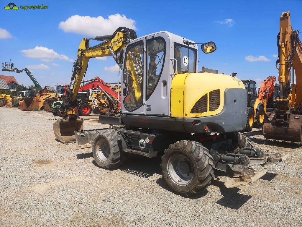 Wacker Neuson EW 100 - Máy xúc bánh lốp: hình 5 Wacker Neuson EW 100 - Máy xúc bánh lốp: hình 5