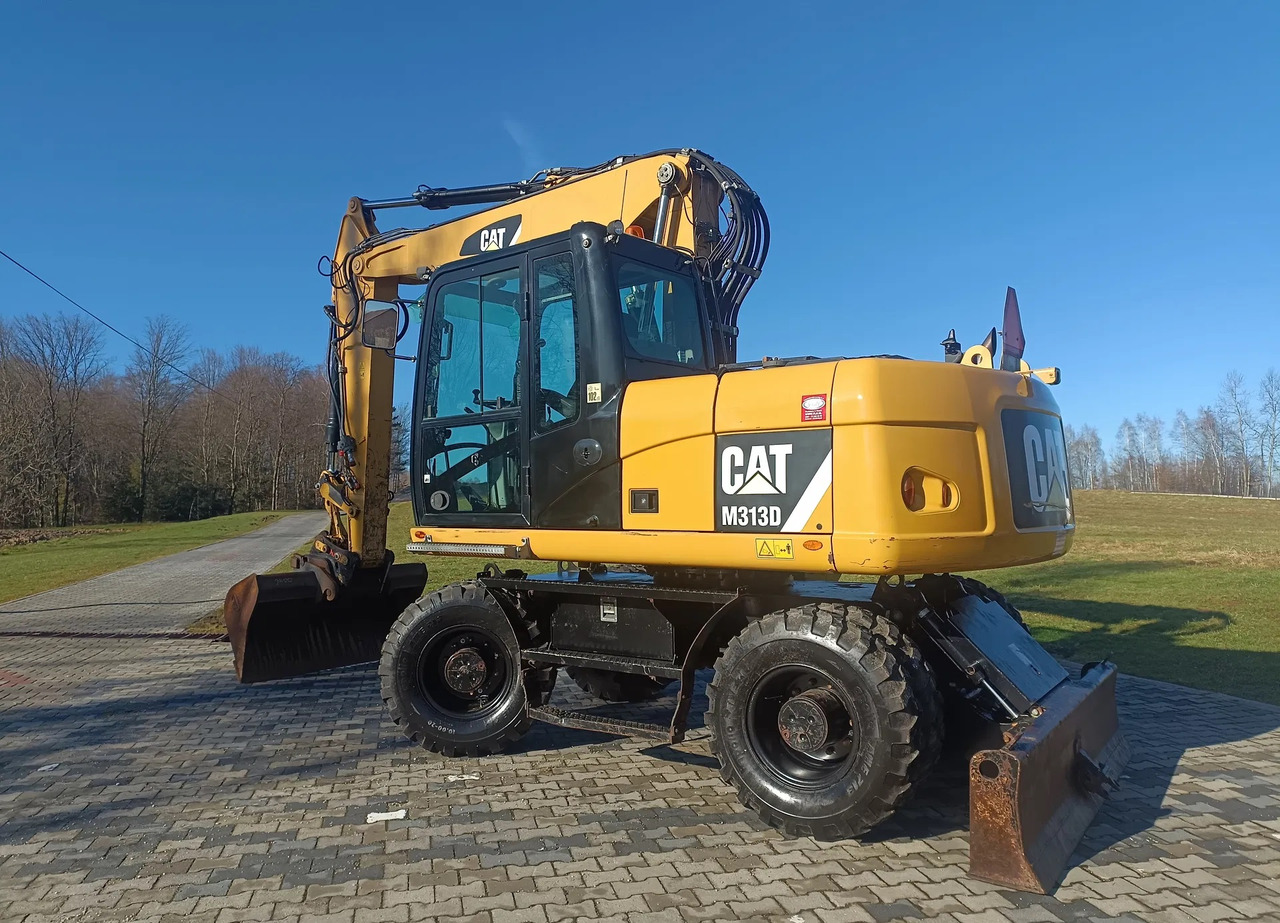 CATERPILLAR M313D - Máy xúc bánh lốp: hình 1 CATERPILLAR M313D - Máy xúc bánh lốp: hình 1