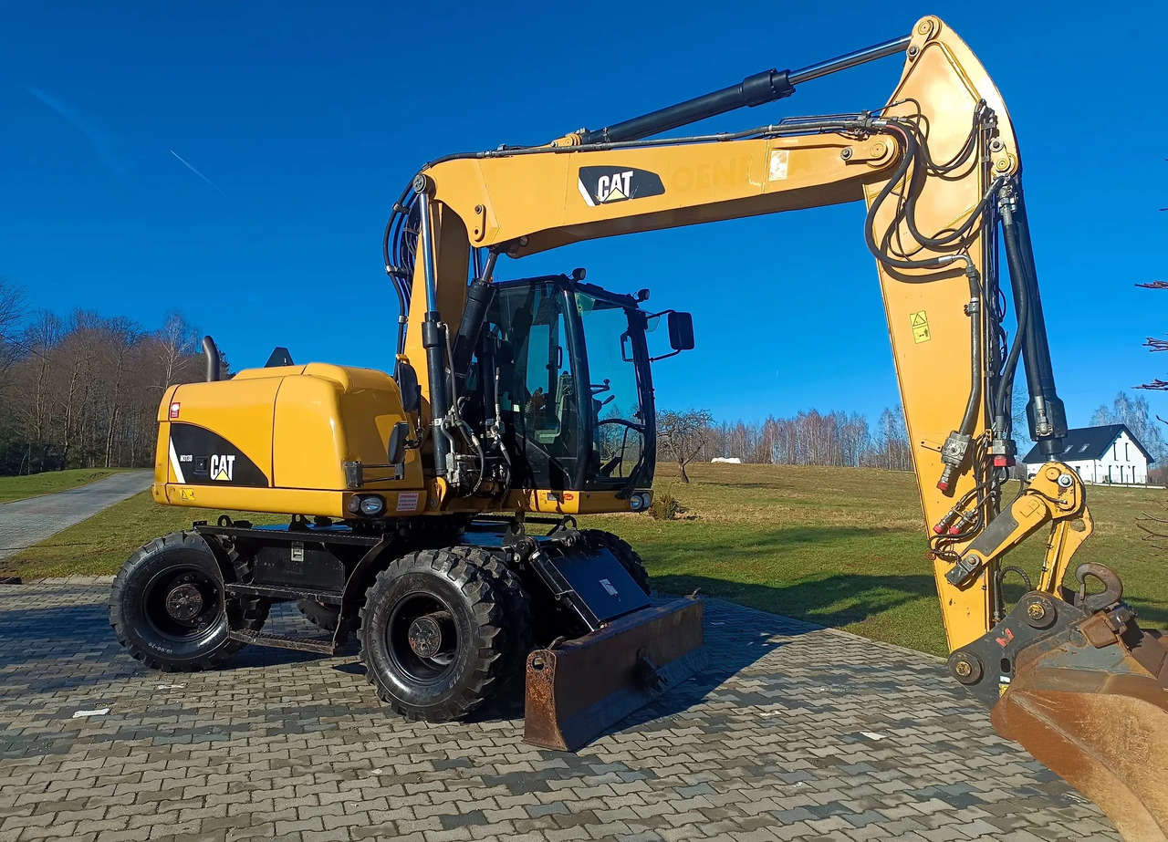 CATERPILLAR M313D - Máy xúc bánh lốp: hình 2 CATERPILLAR M313D - Máy xúc bánh lốp: hình 2