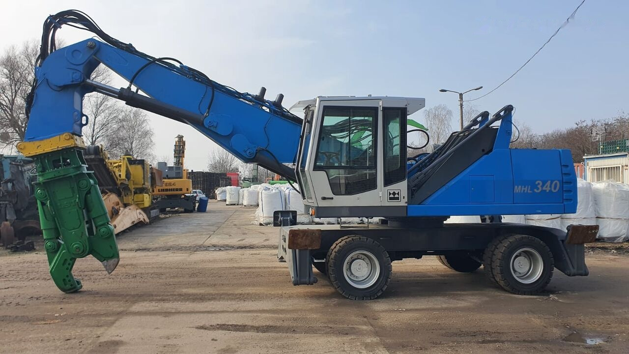 Fuchs MHL 340D FQC + LST 3to shear - Máy cạp rác/ Công nghiệp: hình 1 Fuchs MHL 340D FQC + LST 3to shear - Máy cạp rác/ Công nghiệp: hình 1