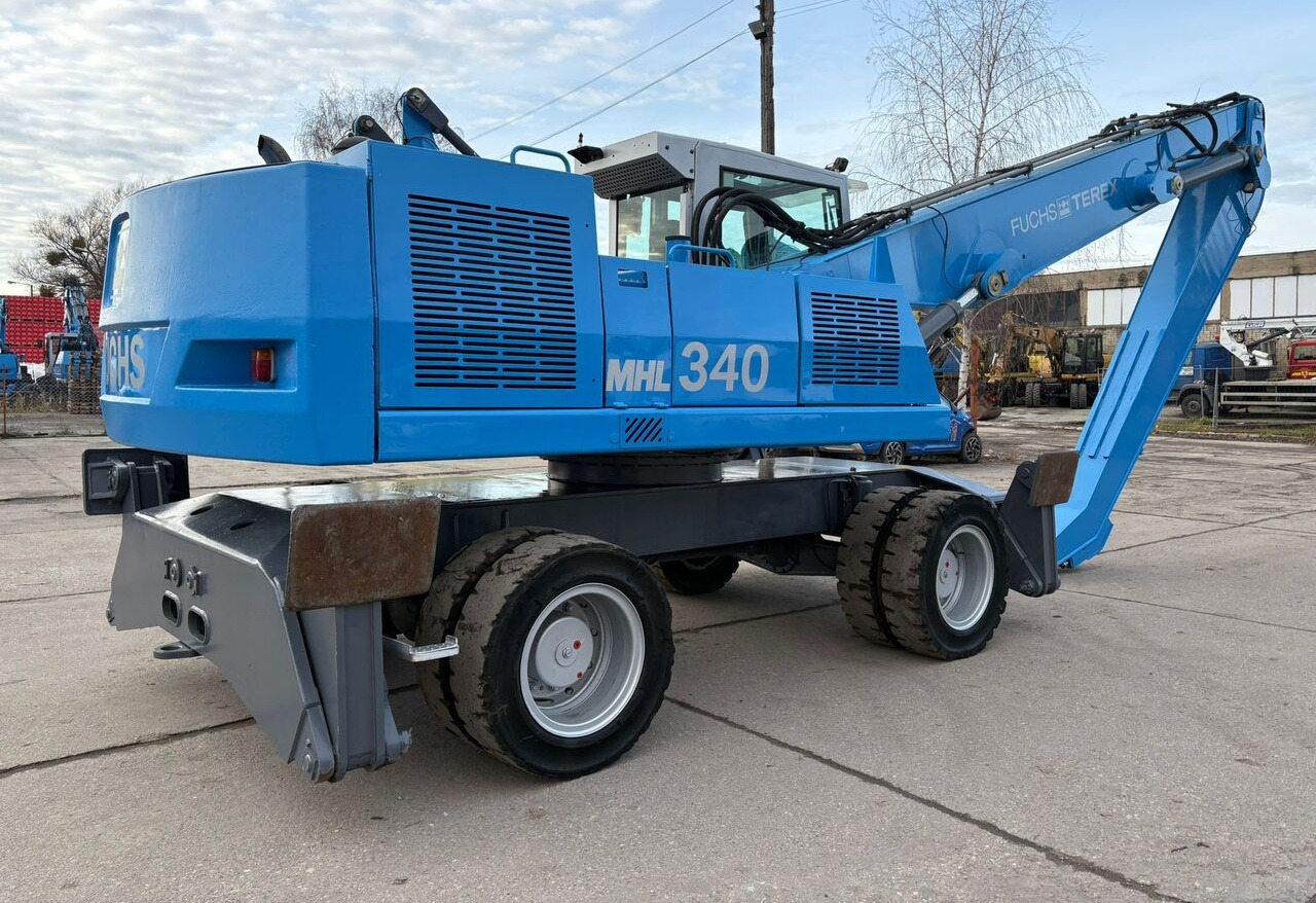 Máy cạp rác/ Công nghiệp Terex-Fuchs MHL 340 C: hình 8 Máy cạp rác/ Công nghiệp Terex-Fuchs MHL 340 C: hình 8