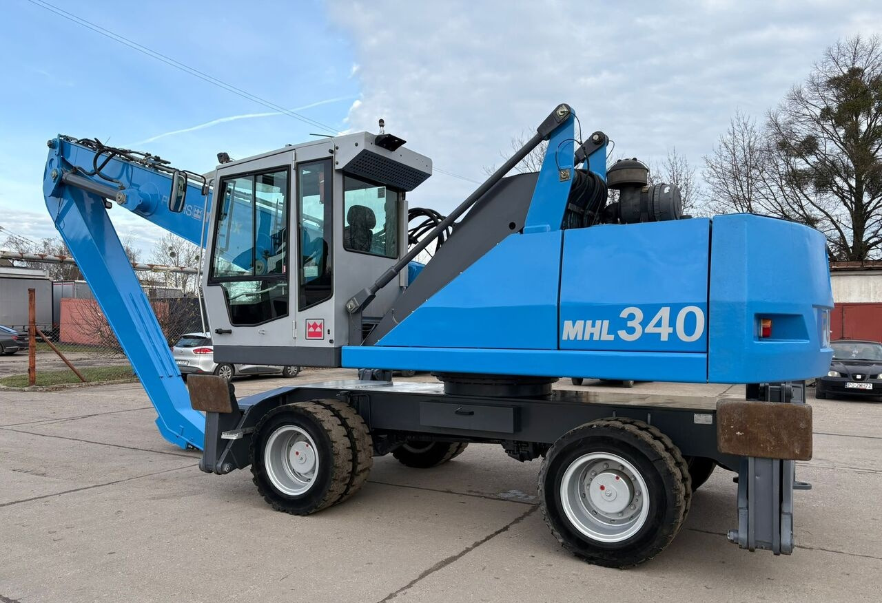 Máy cạp rác/ Công nghiệp Terex-Fuchs MHL 340 C: hình 11 Máy cạp rác/ Công nghiệp Terex-Fuchs MHL 340 C: hình 11