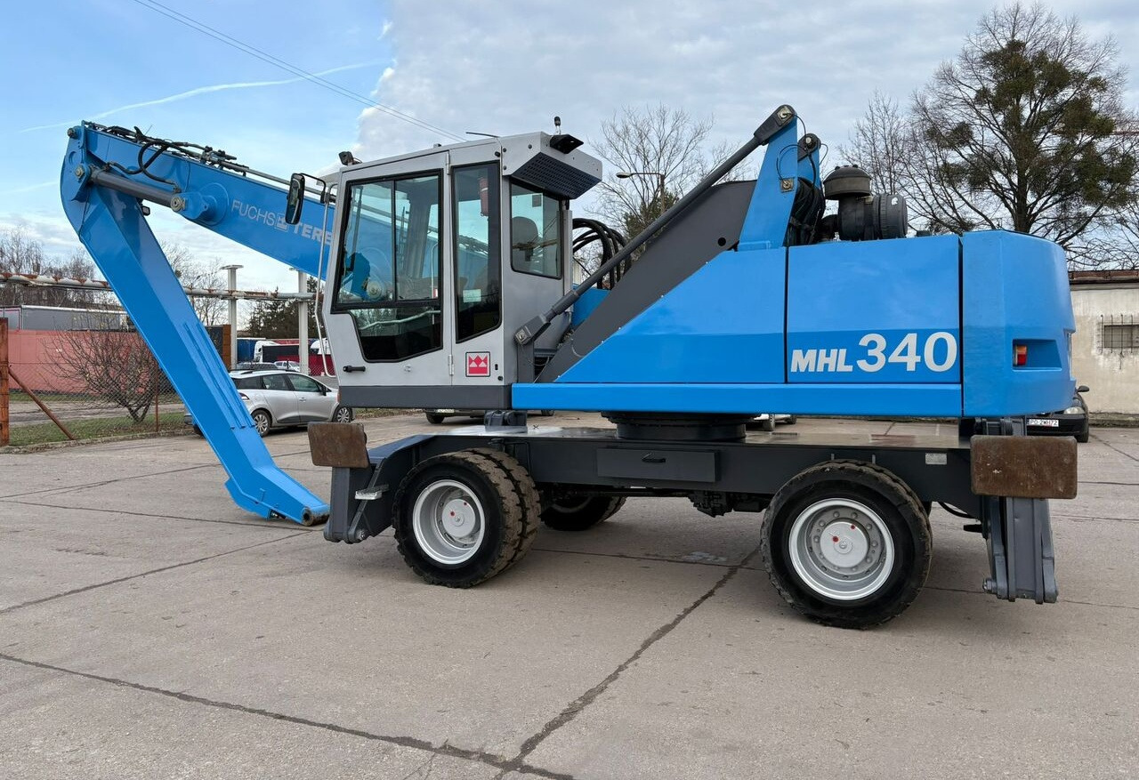 Máy cạp rác/ Công nghiệp Terex-Fuchs MHL 340 C: hình 12 Máy cạp rác/ Công nghiệp Terex-Fuchs MHL 340 C: hình 12