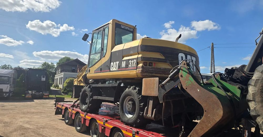 Caterpillar M312 - Máy xúc bánh lốp: hình 4 Caterpillar M312 - Máy xúc bánh lốp: hình 4
