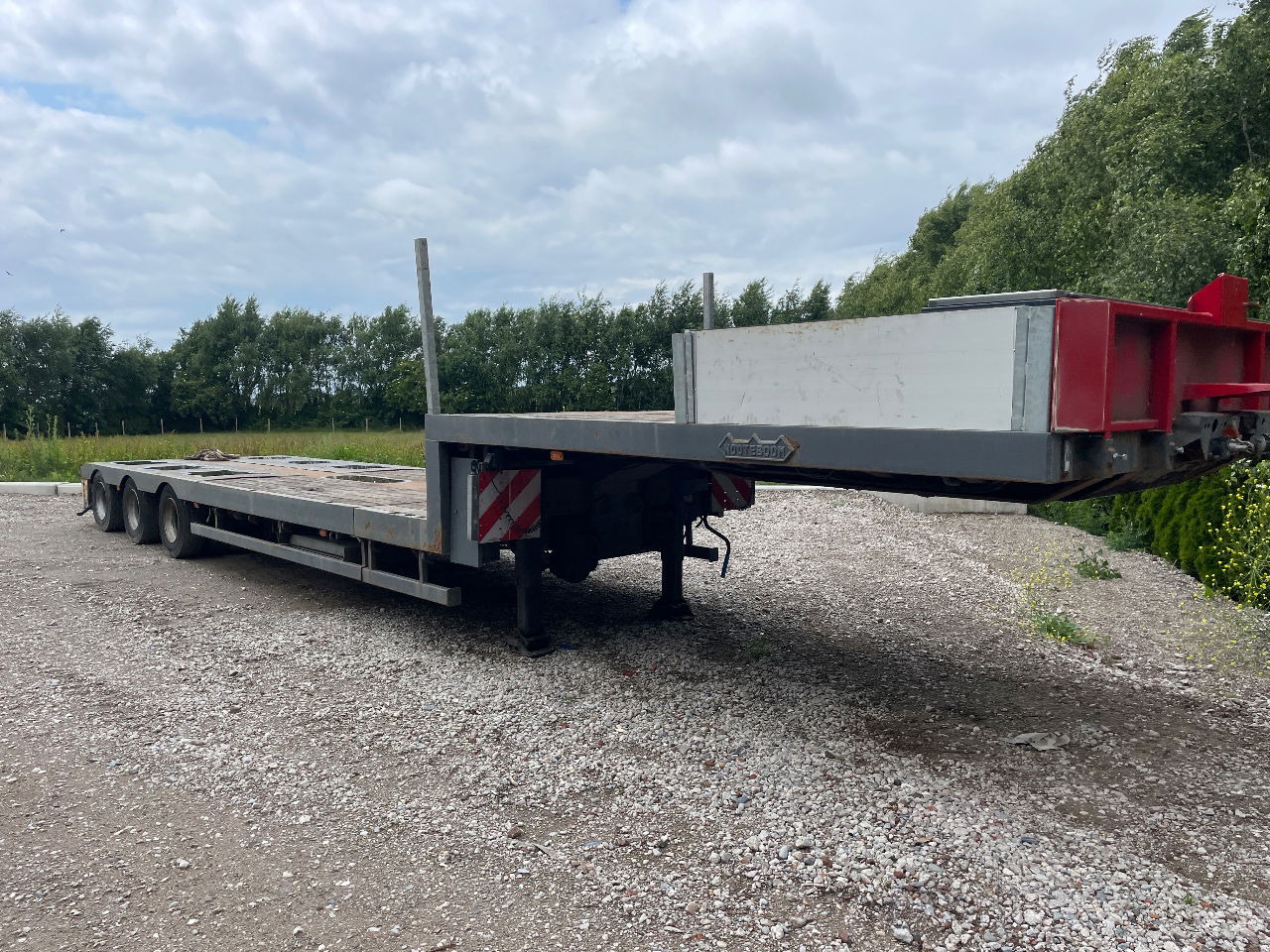 Nooteboom Mco-48-03 V uitschuifbaar hydrolisch gestuurd semi dieplader - Sơ mi rơ moóc thùng thấp: hình 1 Nooteboom Mco-48-03 V uitschuifbaar hydrolisch gestuurd semi dieplader - Sơ mi rơ moóc thùng thấp: hình 1