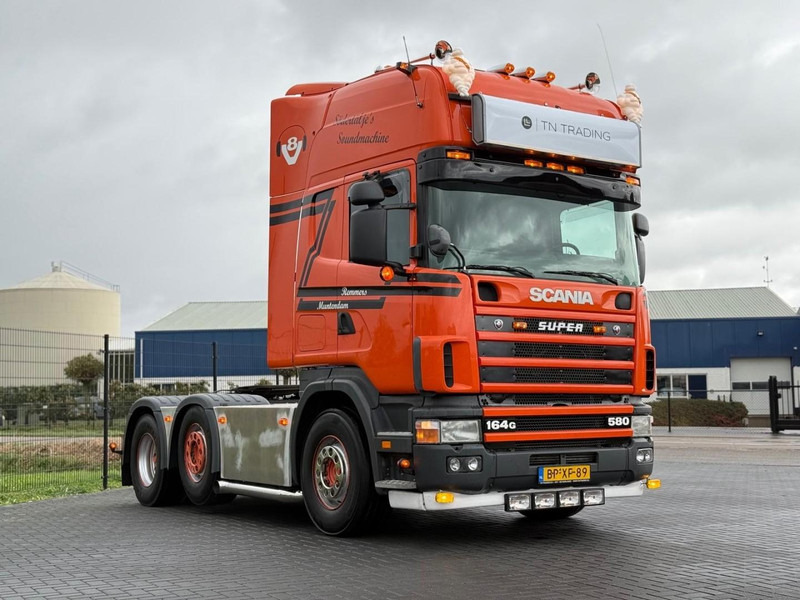 Scania R 164 GA 6X2/4 NA 580 SHOW TRUCK, GESTUURDE VOORLOPER, COMPLEET, TOP. - Xe đầu kéo: hình 1 Scania R 164 GA 6X2/4 NA 580 SHOW TRUCK, GESTUURDE VOORLOPER, COMPLEET, TOP. - Xe đầu kéo: hình 1