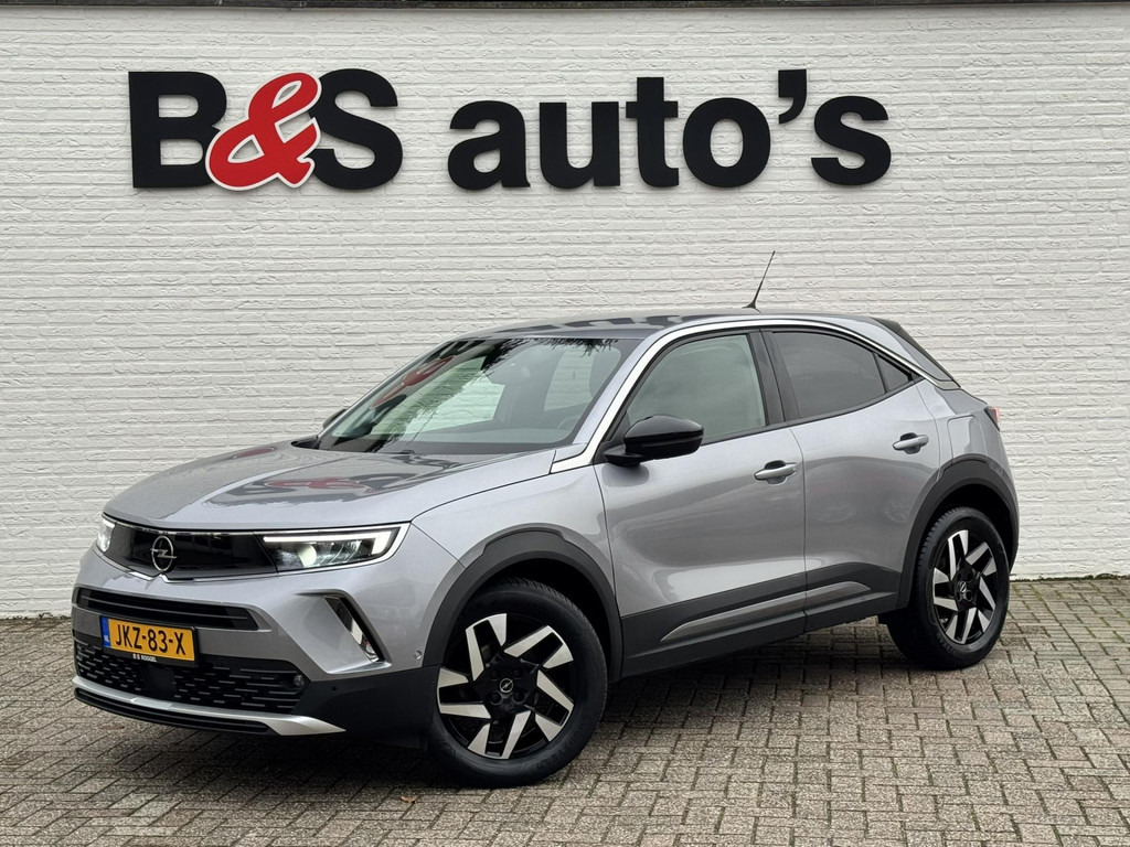 Opel Mokka-1.2 Turbo Elegance Cruise control Climate control Stoel- stuurverwarming Apple / Android Parkeersensoren plus camera - SUV: hình 1 Opel Mokka-1.2 Turbo Elegance Cruise control Climate control Stoel- stuurverwarming Apple / Android Parkeersensoren plus camera - SUV: hình 1