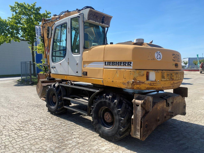 Liebherr A316 Litronic NVT - Máy xúc bánh lốp: hình 1 Liebherr A316 Litronic NVT - Máy xúc bánh lốp: hình 1