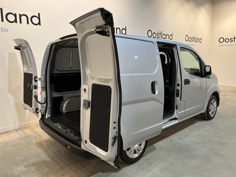Nissan E-NV200 Business 40 kWh / 100% elektrisch !! / Airco / Cruise Control / Camera / Navigatie / 9.800 KM !! / BPM VRIJ !! - Xe van nhỏ gọn, Xe van điện: hình 4 Nissan E-NV200 Business 40 kWh / 100% elektrisch !! / Airco / Cruise Control / Camera / Navigatie / 9.800 KM !! / BPM VRIJ !! - Xe van nhỏ gọn, Xe van điện: hình 4