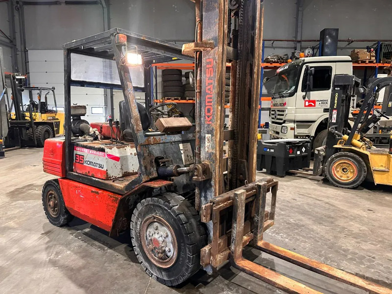 Komatsu FD 35 - Xe nâng diesel: hình 3 Komatsu FD 35 - Xe nâng diesel: hình 3