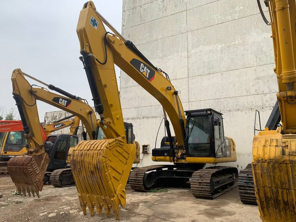 CAT 323 D L - Máy xúc bánh xích: hình 1 CAT 323 D L - Máy xúc bánh xích: hình 1
