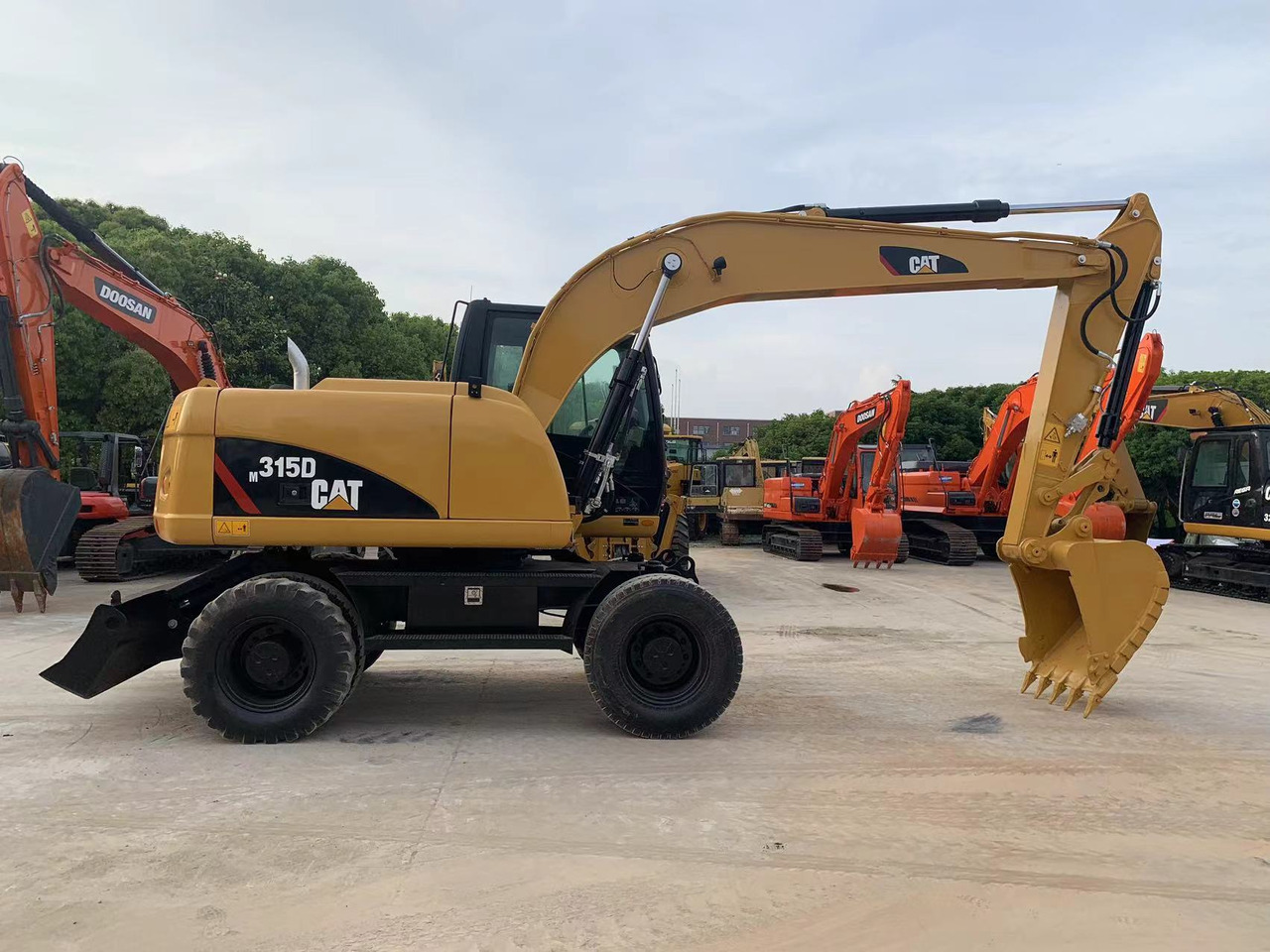 CATERPILLAR 315D - Máy xúc bánh lốp: hình 1 CATERPILLAR 315D - Máy xúc bánh lốp: hình 1