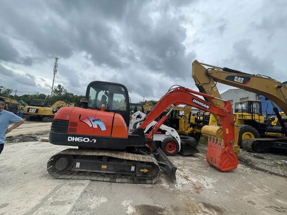 Doosan DH60-7 - Máy xúc mini: hình 1 Doosan DH60-7 - Máy xúc mini: hình 1