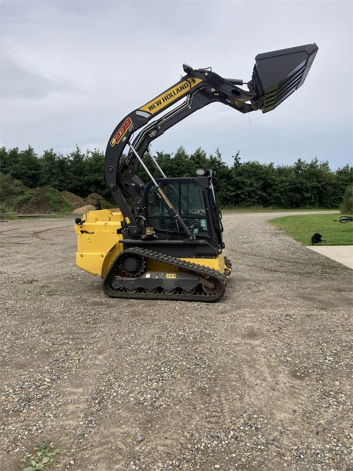 New Holland C 238 LOADER - Máy xúc lật mini bánh xích: hình 2 New Holland C 238 LOADER - Máy xúc lật mini bánh xích: hình 2
