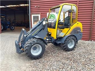 Eurotrac W12 med førerhus - Máy xúc lật mini gấp khúc: hình 1 Eurotrac W12 med førerhus - Máy xúc lật mini gấp khúc: hình 1