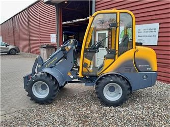 Eurotrac W12S med førerhus, skovl og gafler - Máy xúc lật bánh lốp: hình 1 Eurotrac W12S med førerhus, skovl og gafler - Máy xúc lật bánh lốp: hình 1