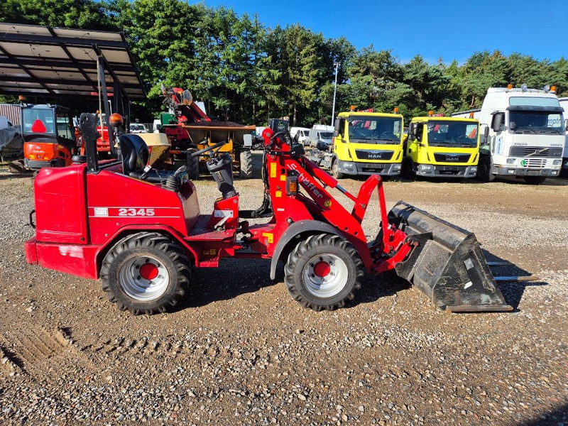 Schäffer 2345 (Bucket/Forks) - Máy xúc lật mini bánh xích: hình 5 Schäffer 2345 (Bucket/Forks) - Máy xúc lật mini bánh xích: hình 5