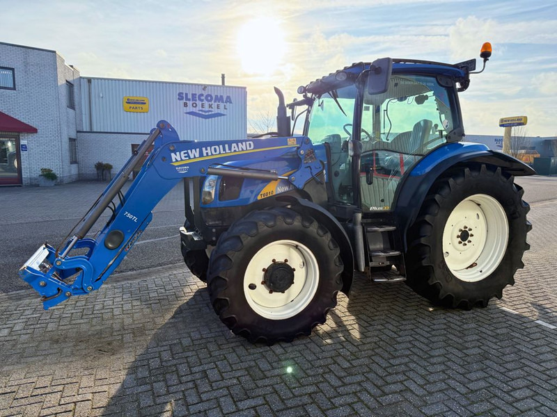 New Holland T6010 Plus + 750TL Voorlader - Máy cày: hình 1 New Holland T6010 Plus + 750TL Voorlader - Máy cày: hình 1