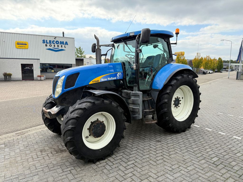 New Holland T7040 Power Command - Máy cày: hình 1 New Holland T7040 Power Command - Máy cày: hình 1