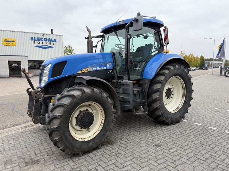 New Holland T7050 Power Command - Máy cày: hình 1 New Holland T7050 Power Command - Máy cày: hình 1