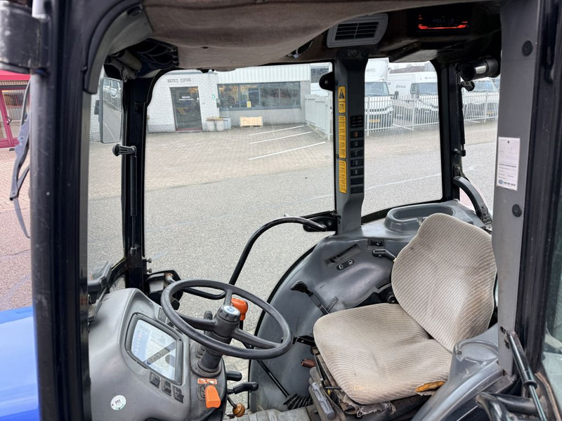 New Holland TN95NA Smalspoortrekker - Máy cày mini: hình 5 New Holland TN95NA Smalspoortrekker - Máy cày mini: hình 5