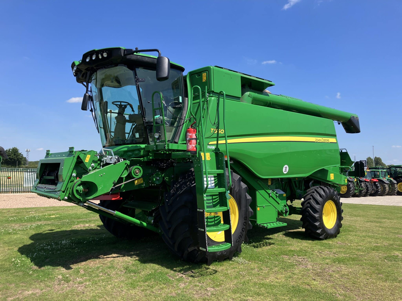 John Deere T550i - Máy gặt đập: hình 1 John Deere T550i - Máy gặt đập: hình 1