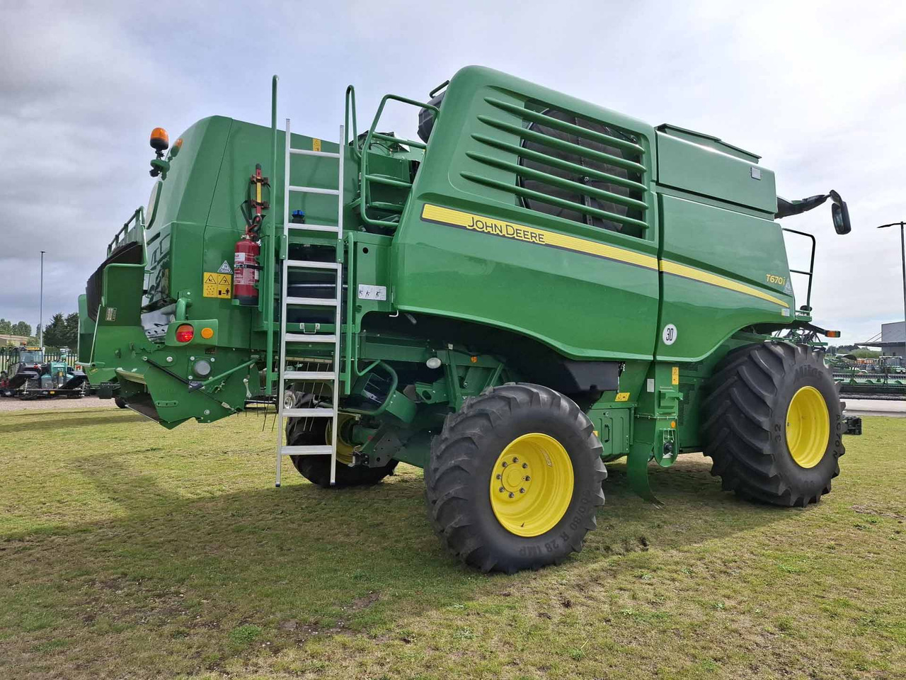 John Deere T670 - Máy gặt đập: hình 4 John Deere T670 - Máy gặt đập: hình 4
