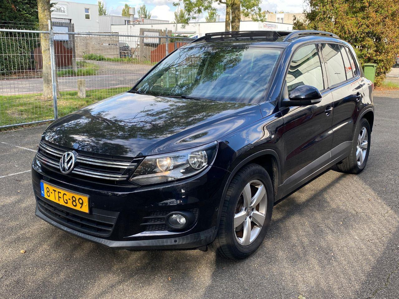 Volkswagen Tiguan 1.4 TSI Comfort&Design Edition | 2014 | 82.628 km | 8TFG89 | NAP: Logisch - SUV: hình 1 Volkswagen Tiguan 1.4 TSI Comfort&Design Edition | 2014 | 82.628 km | 8TFG89 | NAP: Logisch - SUV: hình 1