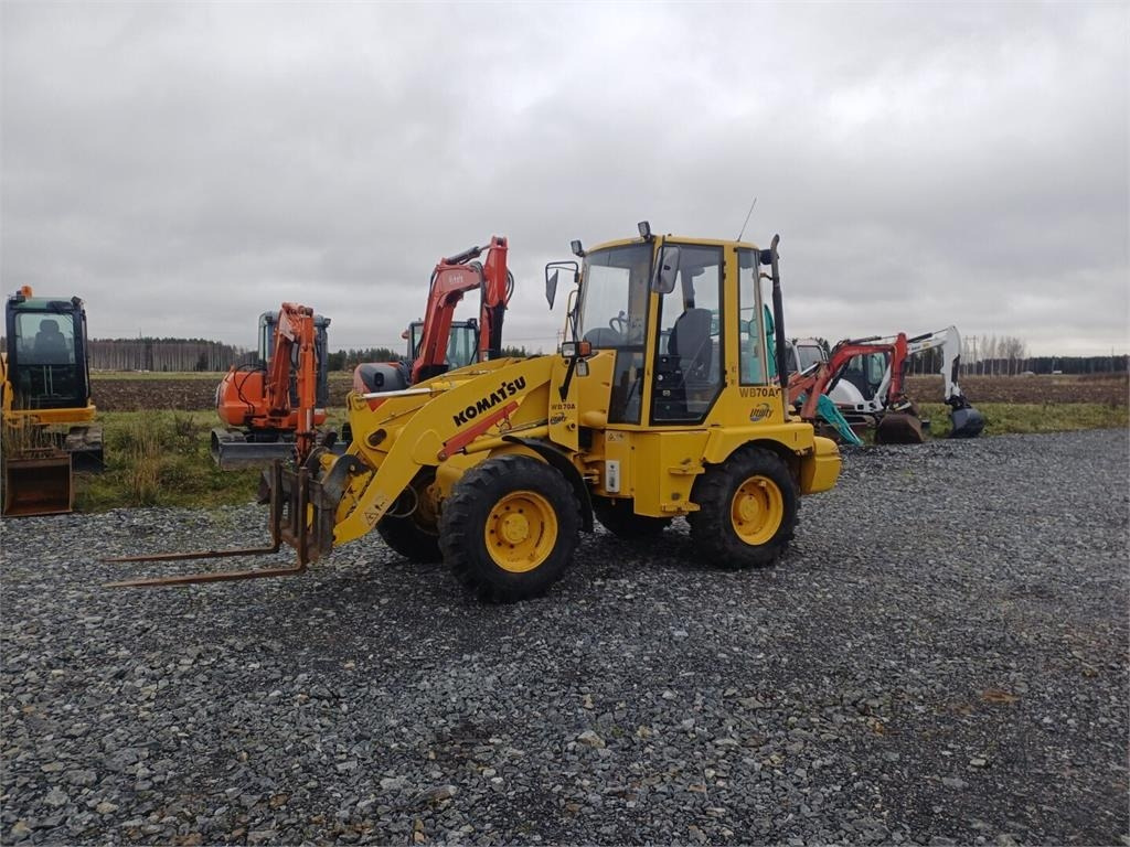 Komatsu WB70A Pyöräkuormaaja - Máy xúc lật bánh lốp: hình 1 Komatsu WB70A Pyöräkuormaaja - Máy xúc lật bánh lốp: hình 1