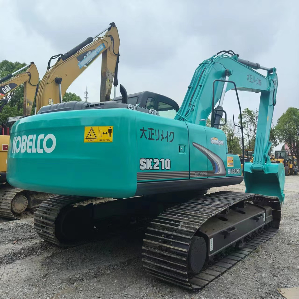 KOBELCO SK210 - Máy xúc bánh xích: hình 5 KOBELCO SK210 - Máy xúc bánh xích: hình 5