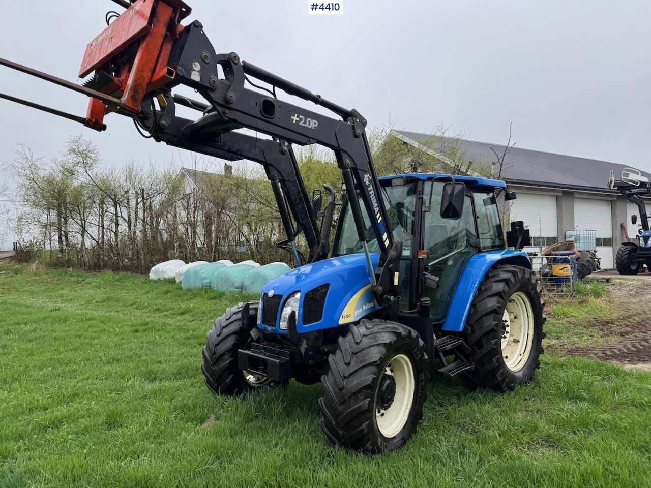 2006 New Holland TL100 A w/Front Loader. - Máy cày: hình 1 2006 New Holland TL100 A w/Front Loader. - Máy cày: hình 1
