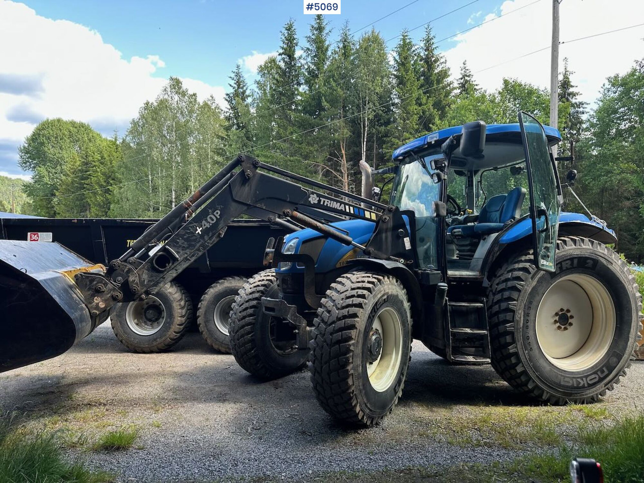 2009 New Holland T6040 SS w/ Trima front loader - Máy cày: hình 1 2009 New Holland T6040 SS w/ Trima front loader - Máy cày: hình 1