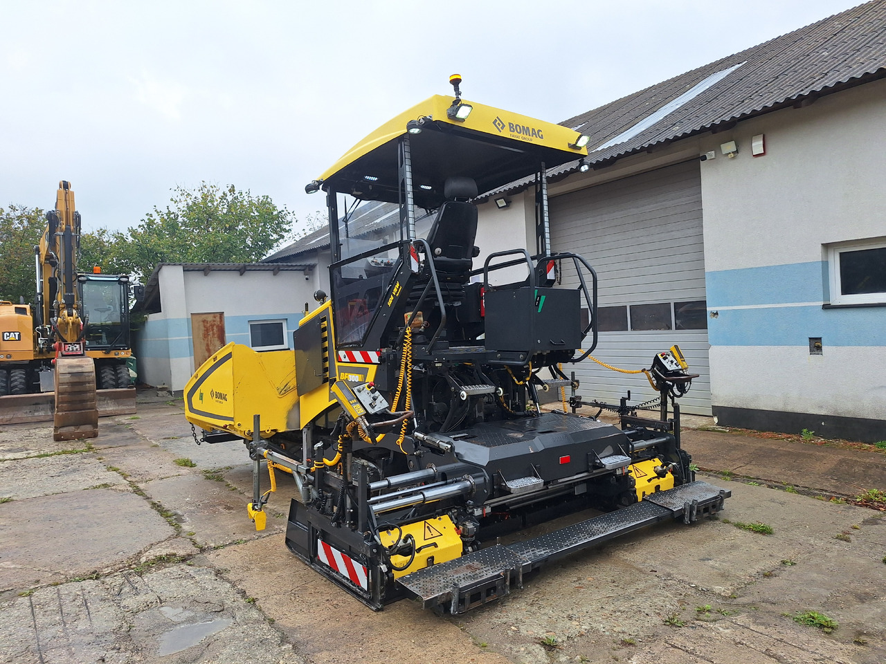 Bomag Bf 300C-3 - Máy lát nhựa đường: hình 4 Bomag Bf 300C-3 - Máy lát nhựa đường: hình 4