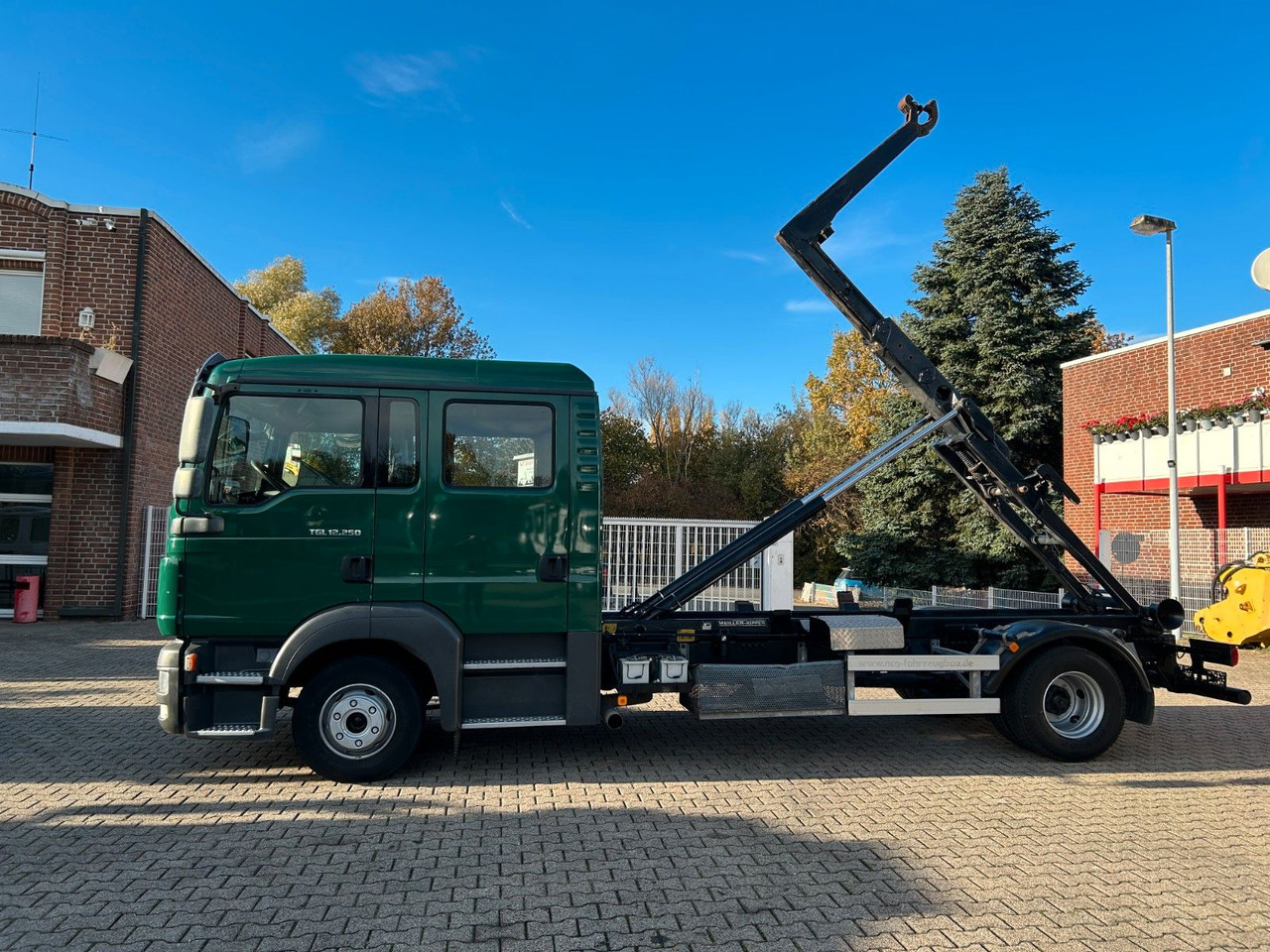 MAN 12.250 Doppelkabine Abroller - Xe tải nâng móc: hình 5 MAN 12.250 Doppelkabine Abroller - Xe tải nâng móc: hình 5