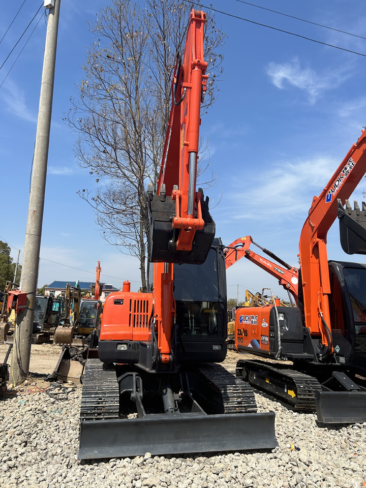 Doosan DX60 - Máy xúc mini: hình 2 Doosan DX60 - Máy xúc mini: hình 2