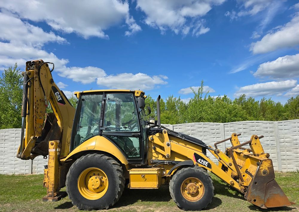 Caterpillar - Máy xúc trước múc sau: hình 5 Caterpillar - Máy xúc trước múc sau: hình 5