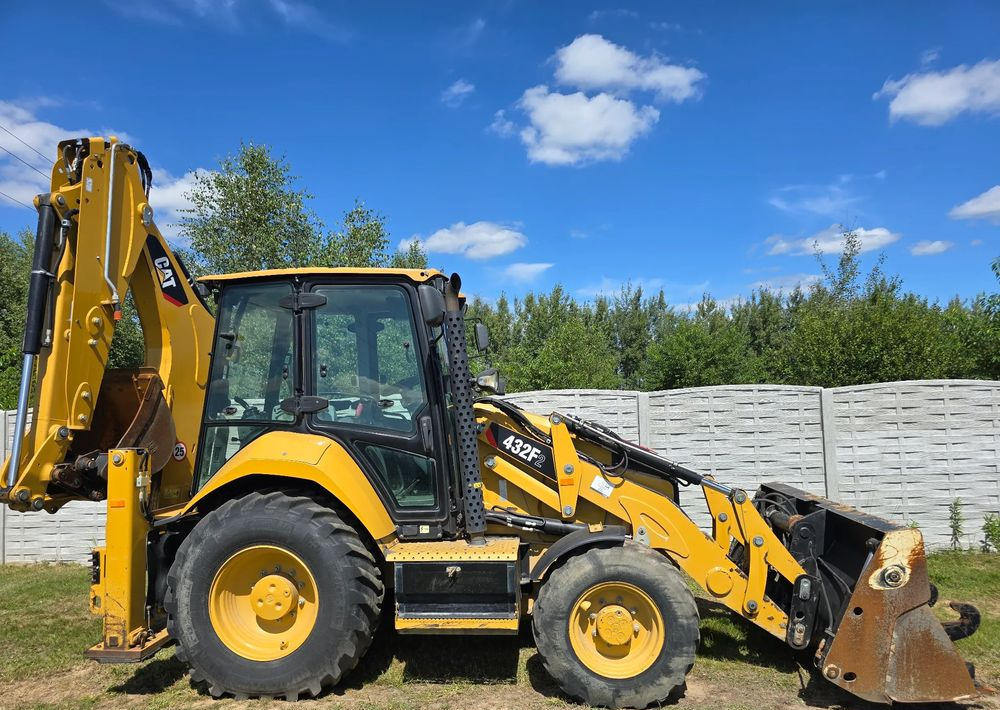 Máy xúc trước múc sau Caterpillar: hình 9