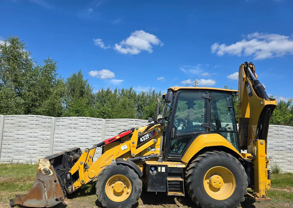 Máy xúc trước múc sau Caterpillar: hình 6